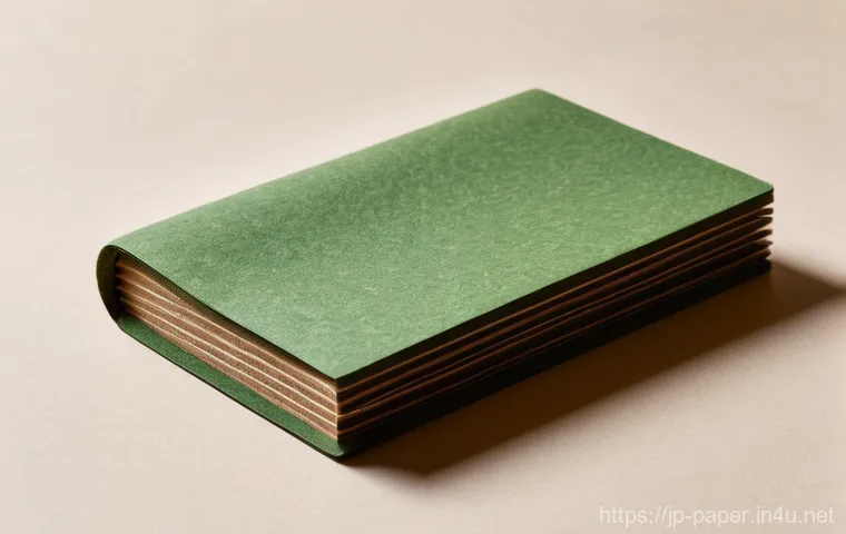 종이의 질감과 표면 - **Prompt:** An artistic and minimalist still life composition featuring various paper swatches, meti...